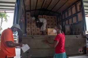 Volunteers assisting with the packing of hampers.